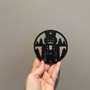 Bilde av den sorte baksiden på jule drikkeunderlag, design 4 av 4.