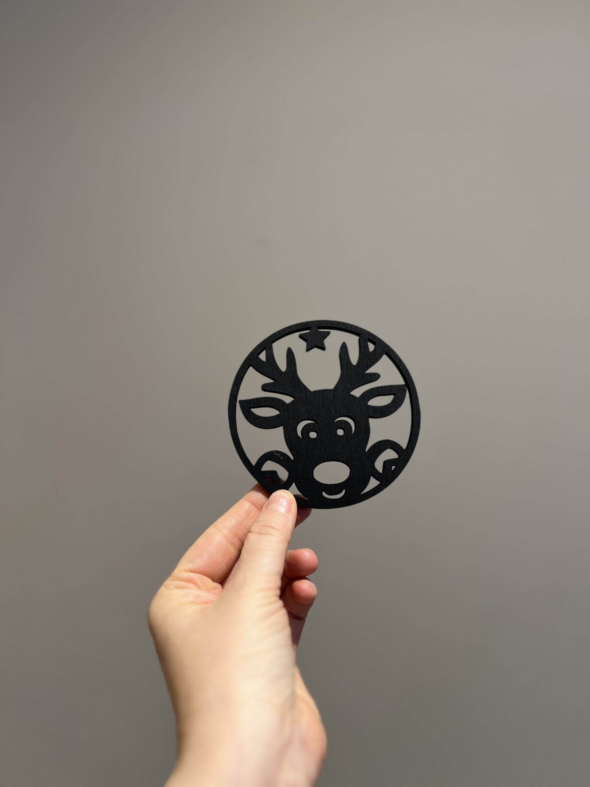 Bilde av den sorte baksiden på jule drikkeunderlag, design 2 av 4.
