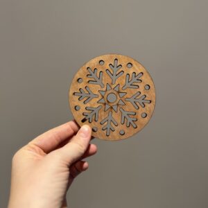 Bilde av den klare forsiden på snøflak drikkeunderlag, design 2 av 2.