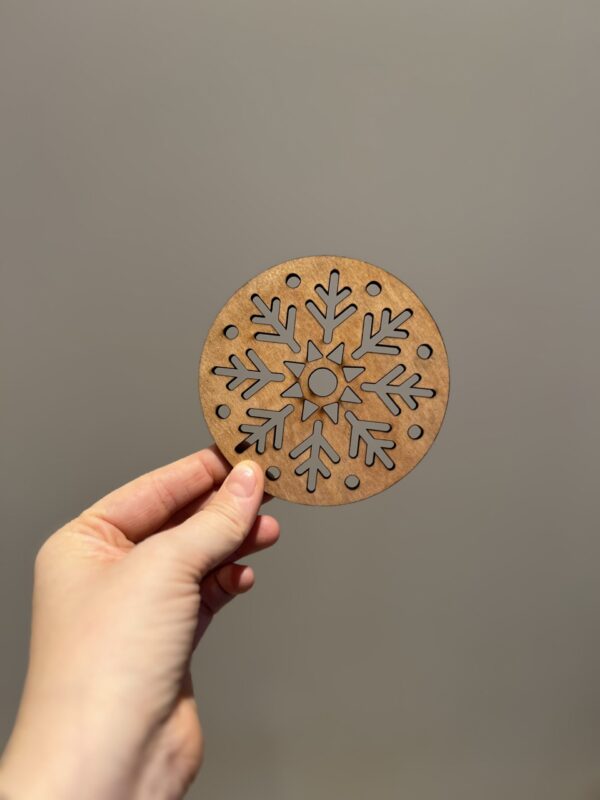 Bilde av den klare forsiden på snøflak drikkeunderlag, design 2 av 2.