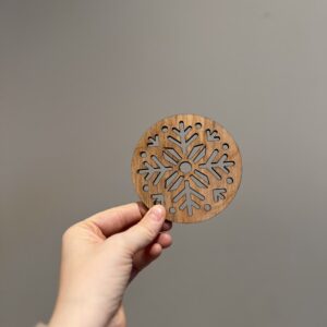 Bilde av den klare forsiden på snøflak drikkeunderlag, design 1 av 2.